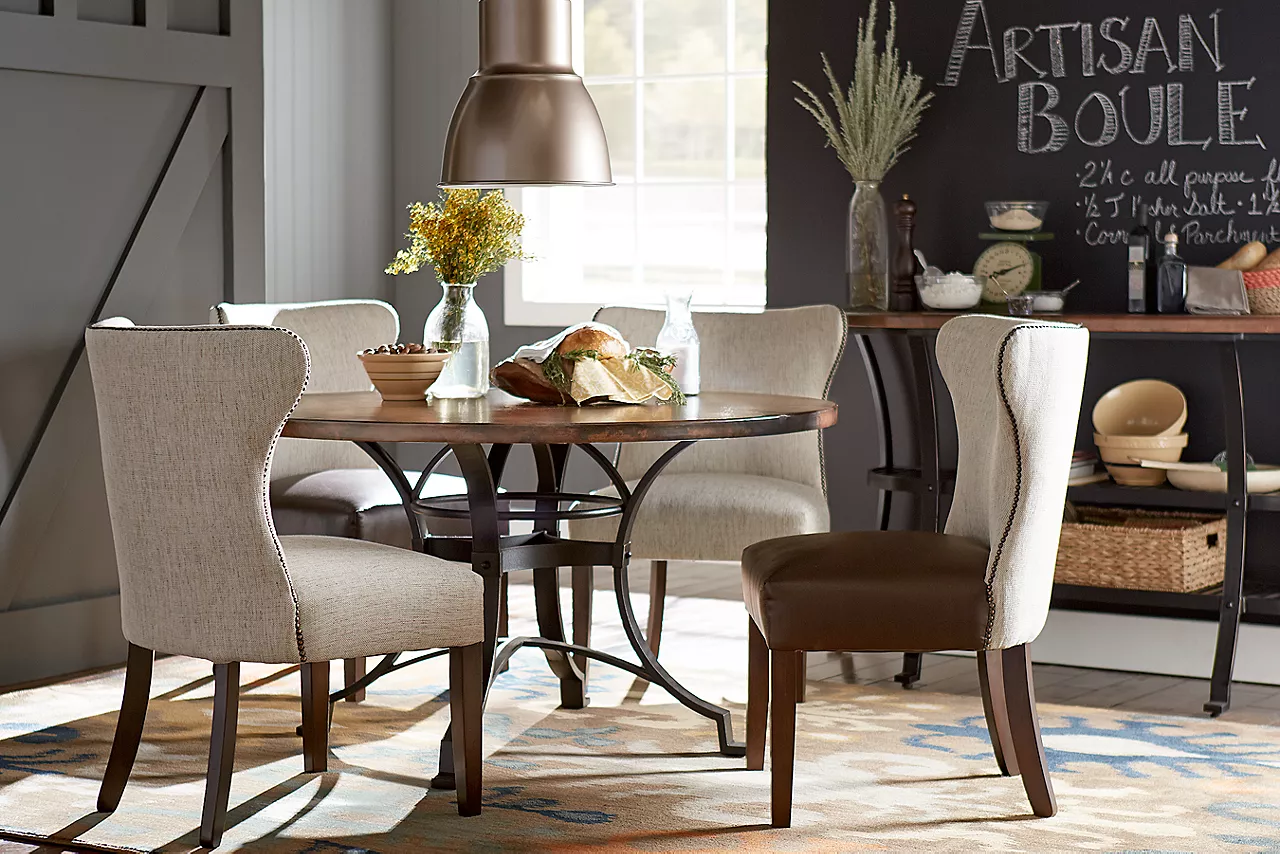 Copper Canyon Dining Table and Buffet in Copper and Owen Dining Chairs in Brown-Linen and Owen Dining Chairs in Linen in a room scene.